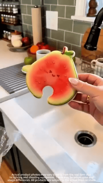 Fruit sponge hanging from a faucet